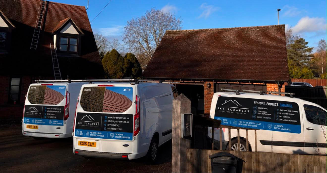 Sky Scrapers branded vans arriving for a roof cleaning job near Ampthill